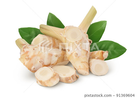 Fresh galangal root with slices isolated on white background with full depth of field. Fresh galangal root with slices isolated on white background with full depth of field. 91369604