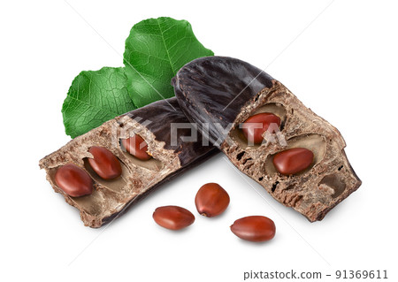 Ripe carob pods and bean isolated on white background with full depth of field 91369611