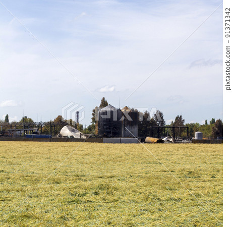 War in Ukraine. oil depot in Ukraine after Russian missile attack. Bombing infrastructure in Ukraine. War of Russia against Ukraine. 91371342