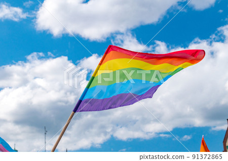 Rainbow flag, a symbol for the LGBT community. The rainbow flag is a symbol of lesbian, gay, bisexual, transgender (LGBT) and queer pride and LGBT social movements. Rainbow flag, a symbol for the LGBT community. The rainbow flag is a symbol of lesbian, gay, bisexual, transgender (LGBT) and queer pride and LGBT social movements. 91372865