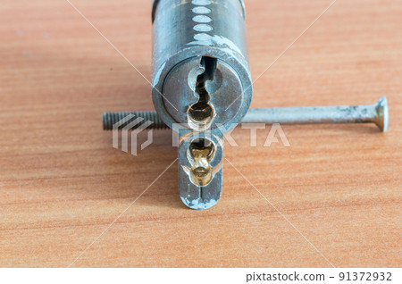 Door lock with drilled holes. Emergency open the lock. 91372932