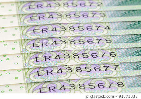 Close-up on serial numbers of new 100 PLN banknotes. 91373335