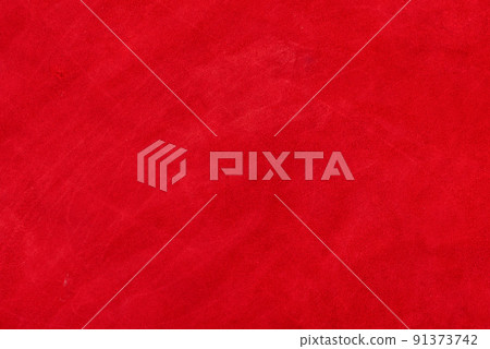 Red suede genuine leather background. Velvet red background close-up photo. 91373742