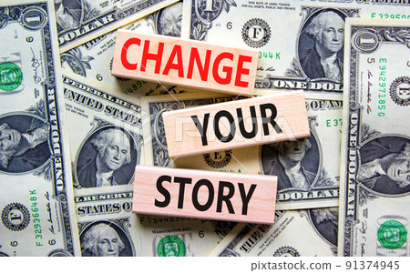 Change your story symbol. Concept words Change your story on wooden blocks on a beautiful background from dollar bills. Business finacial and change your story concept. Copy space. 91374945