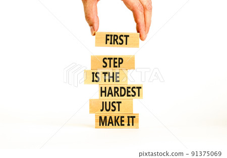 Make first step symbol. Wooden blocks with words First step is the hardest just make it. Beautiful white table white background. Businessman hand. Business and make first step concept. Copy space. Make first step symbol. Wooden blocks with words First step is the hardest just make it. Beautiful white table white background. Businessman hand. Business and make first step concept. Copy space. 91375069