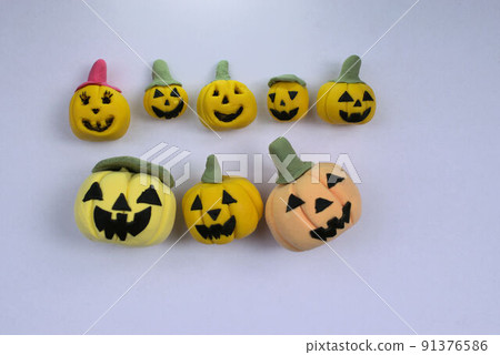 Eight ghost pumpkins for Halloween, handmade miniature clay work, left justified 91376586
