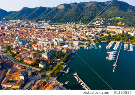 Panoramic view from the drone on the city Como. 91383825