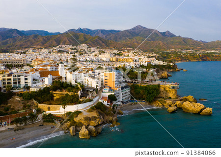 View over the resort town Nerja on Mediterranean coast of Spain View over the resort town Nerja on Mediterranean coast of Spain 91384066