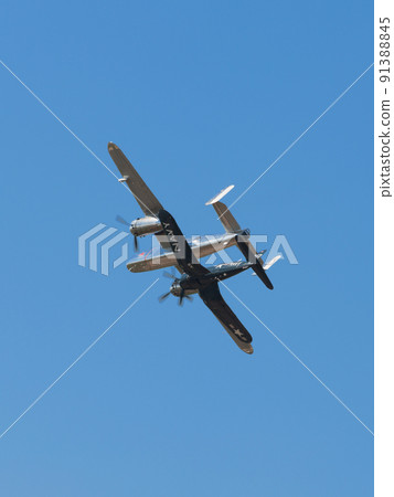 B-25J F4U-4 Corsair carrier-capable fighter escorting Mitchell bomber 91388845
