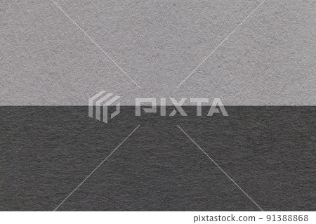 Texture of craft gray and black paper background, half two colors, macro. Structure of vintage dense grey cardboard. 91388868