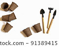 Gardening at home. Growing food on windowsill. Tools, peat pots for seedlings, seeds. top view. Flatlay on white background 91389415
