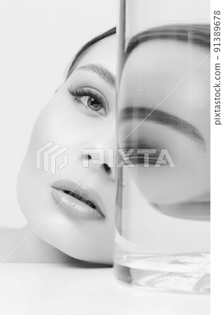 beautiful girl in bottle with water. Black and white Portrait beautiful girl in bottle with water. Black and white Portrait 91389678