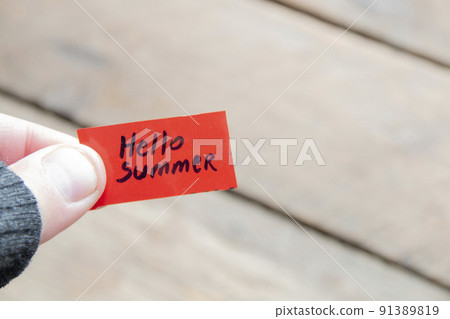Hello summer concept. The inscription on the red tag. 91389819