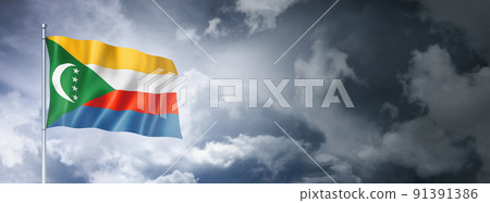 Comorian flag on a cloudy sky Comorian flag on a cloudy sky 91391386
