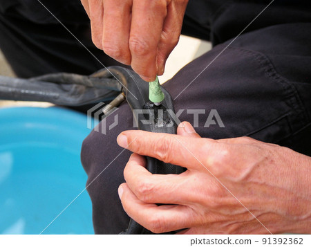 Bicycle flat tire repair Bicycle flat tire repair 91392362
