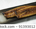 Up of eel kabayaki on a long plate 91393012