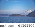 Lake Toya and Mt. Yotei with snow makeup 91393309