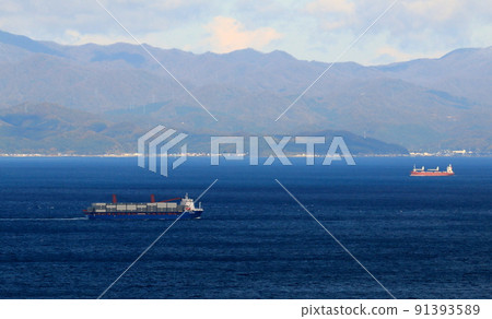 A container ship sailing in the Tsugaru Straits A container ship sailing in the Tsugaru Straits 91393589