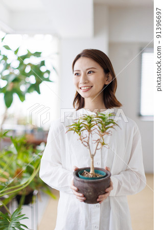 Houseplants and women Houseplants and women 91396697