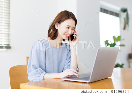 Woman doing work at home 91396834