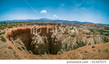 Viewpoint to spectacular formations with unrecognizable tourist 91397075