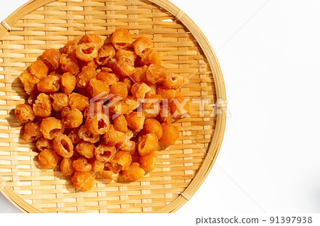 Dried longan on white background. 91397938