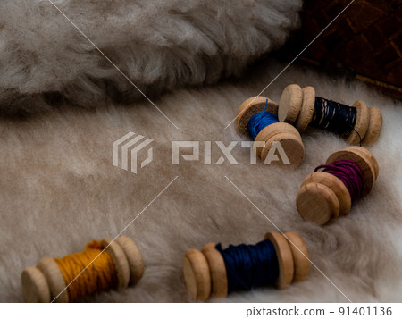 sewing set with wool coils on a fur coat 91401136