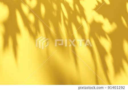 Shadow of leaves on yellow concrete wall texture background Shadow of leaves on yellow concrete wall texture background 91401292