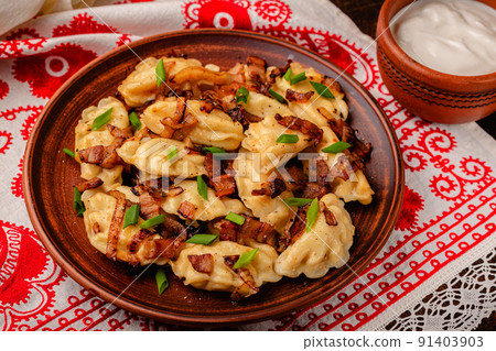 Dumplings, filled with mashed potatoes. 91403903