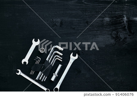 Tools for work or repair auto on black wooden background. Top view 91406076