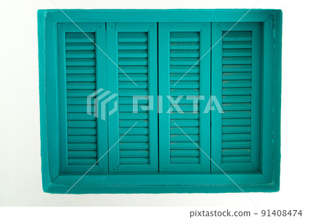 Blue wooden windows that are sealed on white walls Blue wooden windows that are sealed on white walls 91408474