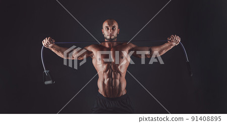 Muscular man exercising doing sit up exercise. Athlete with six pack, white male, no shirt 91408895