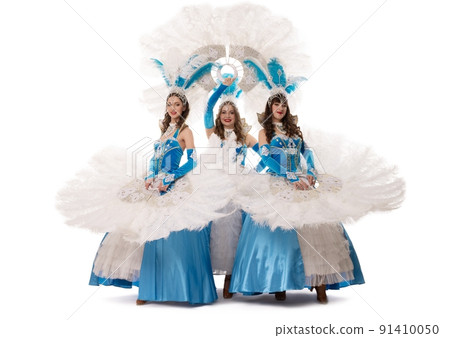 Woman in dance dresses with feather fans 91410050