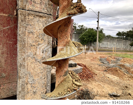Foundation drill bit at house building construction sites Foundation drill bit at house building construction sites 91410266