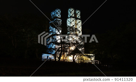 Nirayama Reverberatory Furnace partially lit up in the color of the Ukrainian flag in protest of Russia's military invasion of Ukraine 91411320