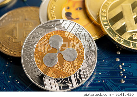 Cryptocurrency electronic coins on circuit mainboard computer, worldwide exchange virtual money, blockchain online concept. 91413430