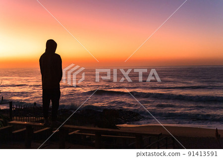 Beach Man Silhouetted Ocean Morning Sky Colors 91413591