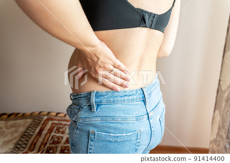 Back pain woman pregnancy. Beautiful pregnant woman having lower back pain. Backache, ache health care concept. 91414400