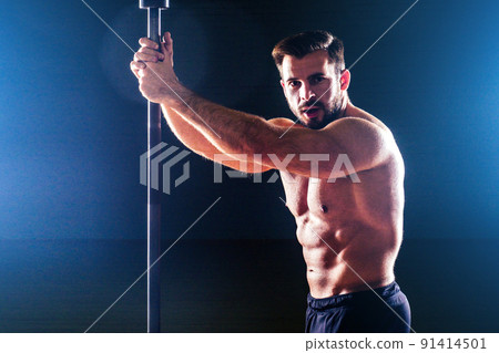Muscular fitness man antique statue perfect muscles six pack abs and bare nude chest bodybuilder Apollo model posing on a black background in the studio. Concept functional training workout gym Muscular fitness man antique statue perfect muscles six pack abs and bare nude chest bodybuilder Apollo model posing on a black background in the studio. Concept functional training workout gym 91414501