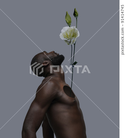 Contemporary art collage. Conceptual image with young man having hole into body with growing flower inside. Purity, innocent emotions Contemporary art collage. Conceptual image with young man having hole into body with growing flower inside. Purity, innocent emotions 91414745