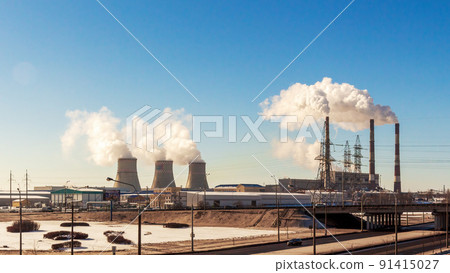 Industrial landscape. Smoke from the pipes of a thermal power plant Industrial landscape. Smoke from the pipes of a thermal power plant 91415027