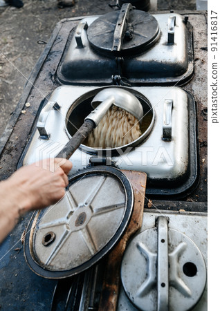Cooking in the field during the war, field kitchen of the Ukrainian military. Cooking in the field during the war, field kitchen of the Ukrainian military. 91416817