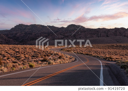 Scenic highway in the mountain landscape. Sunset Sky. 91419720