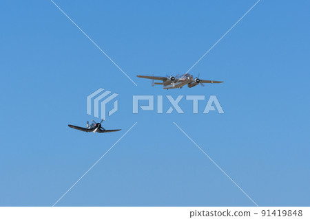 B-25J F4U-4 Corsair carrier-capable fighter escorting Mitchell bomber 91419848
