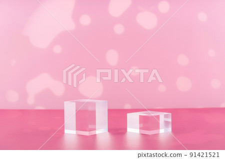 Acrylic blocks on pink background, pedestal cosmetic display glass podium platform for product presentation, geometric stand for cosmetics, mockup scene for jewellery Acrylic blocks on pink background, pedestal cosmetic display glass podium platform for product presentation, geometric stand for cosmetics, mockup scene for jewellery 91421521