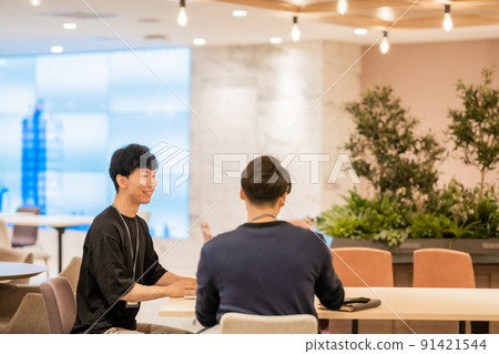 Casual engineer chatting during breaks Casual engineer chatting during breaks 91421544