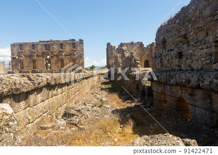 Ruins of the roman bazilica and nymphaeum in the antiquity city of Aspendos 91422471