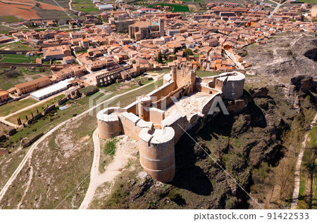 Berlanga de Duero medieval castle ruin near Soria, in the Castilla Leon region Spain with blue sky from air Berlanga de Duero medieval castle ruin near Soria, in the Castilla Leon region Spain with blue sky from air 91422533