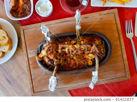 Turkish lamb chop casserole served on table 91422877
