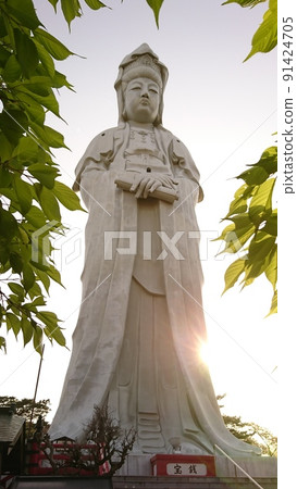 A glimpse of the light from the young leaves, Takasaki Shiroi Daikannon statue A glimpse of the light from the young leaves, Takasaki Shiroi Daikannon statue 91424705